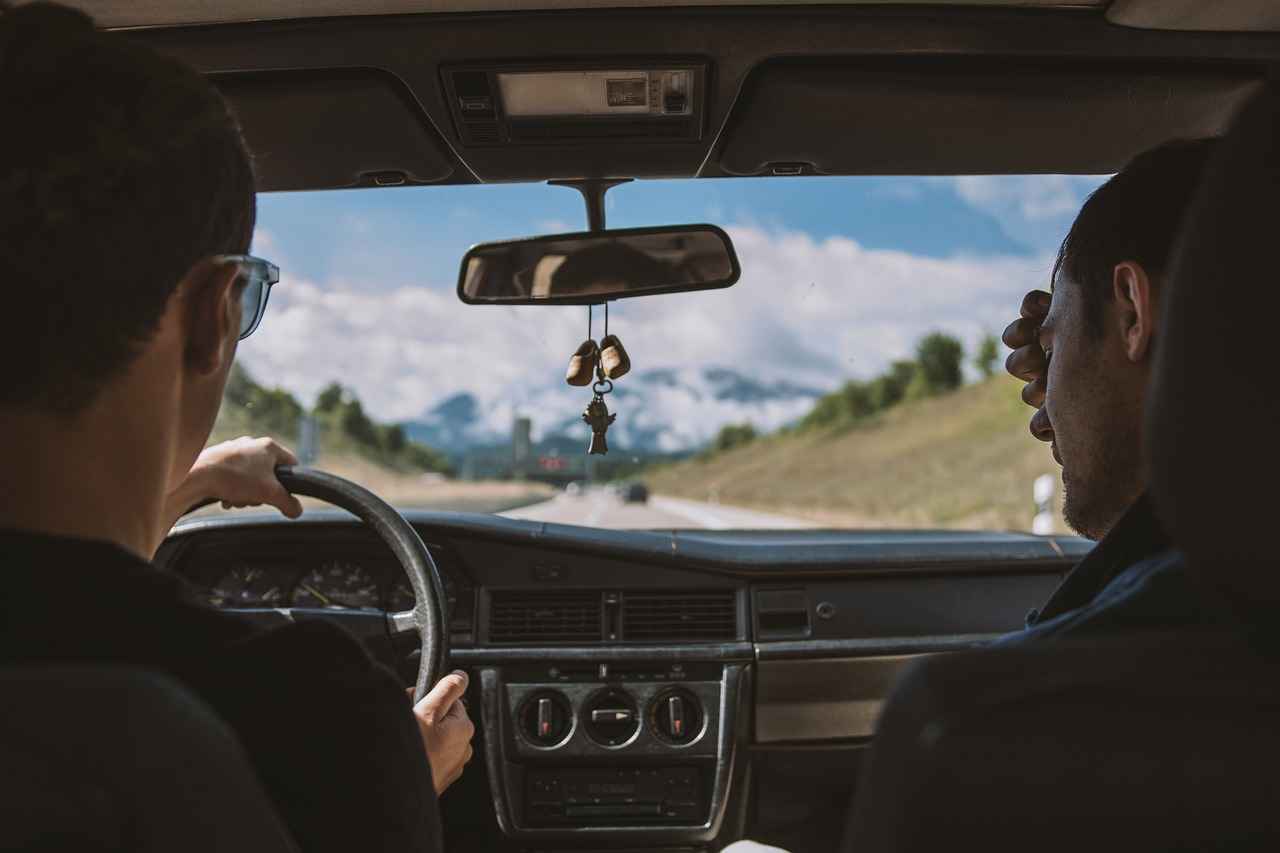 Why Choose a Rearview Mirror Phone Holder?